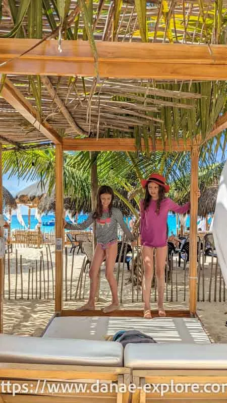 bar in Playa Blanca (at that time it was empty, but then it filled up) Two girls playing in a bamboo tent on the beach