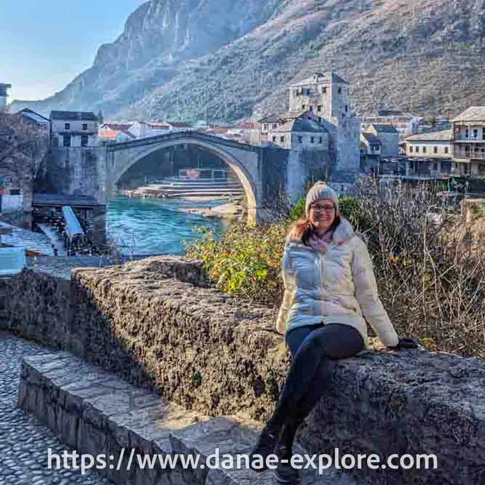 me in front of Stari Most, Bosnia Herzegovina - what to do in Mostar, www.danae-explore.com