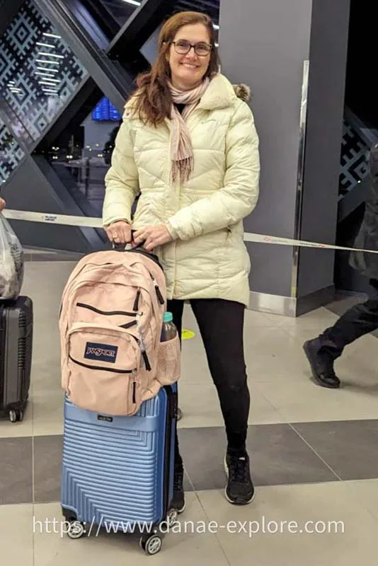 Me with my hand luggage on another international trip - www.danae-explore.com