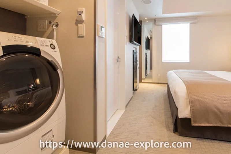 Washes clothes in hotel room in Tokyo