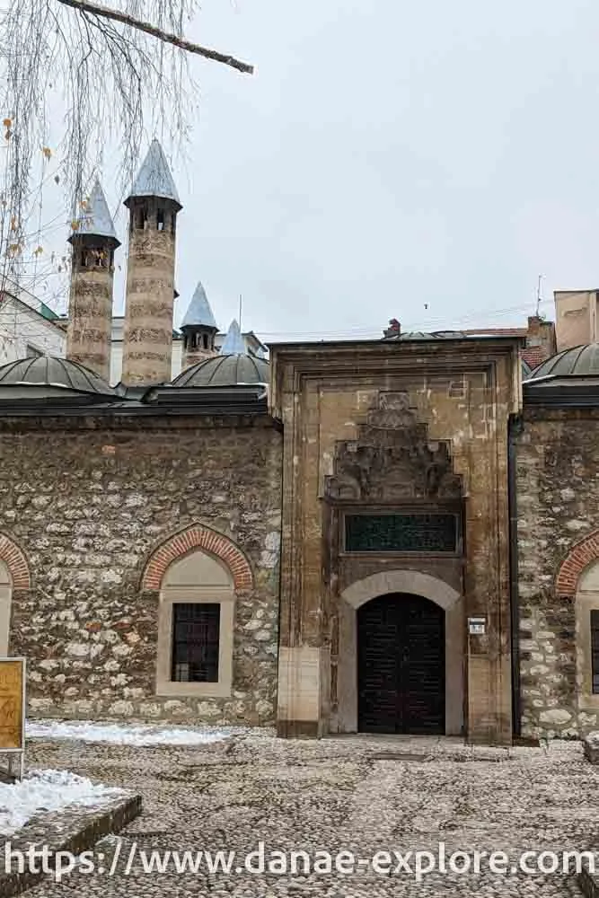 Side view of the Gazi Husrev-begov Mosque in Sarajevo on a cloudy winter day