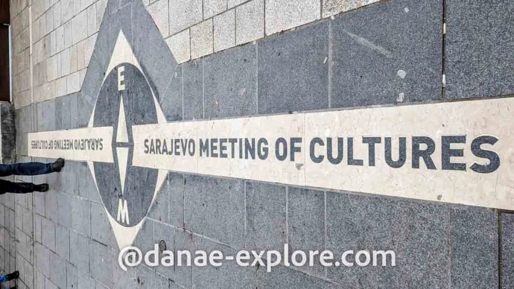 Landmark on the ground in Sarajevo, written "Sarajevo Meeting of Cultures"